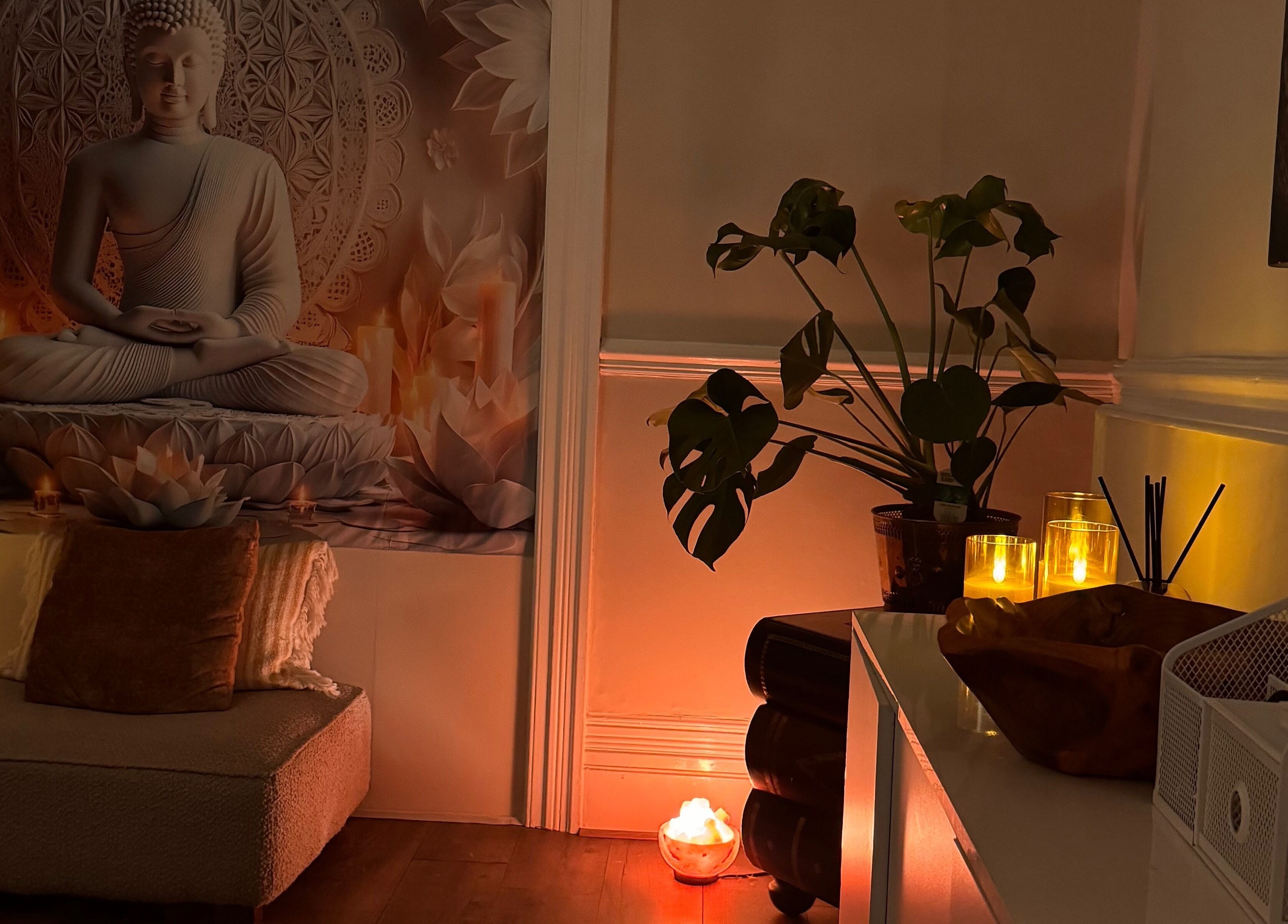 Peaceful room at Soul Sister Holistic Therapy & Wellbeing, Neath, Wales, GB with Buddha statue and soft lighting.