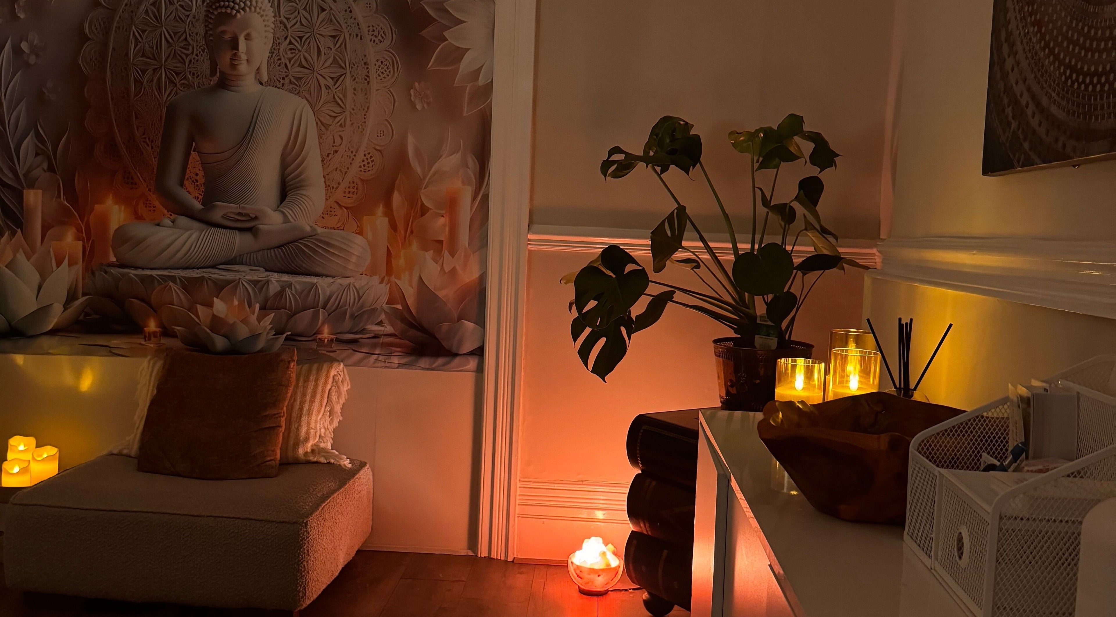 Peaceful room at Soul Sister Holistic Therapy & Wellbeing, Neath, Wales, GB with Buddha statue and soft lighting.