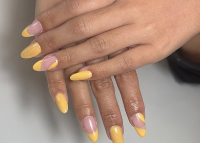 Yellow and pink manicured nails at Sunny Day Nail Studio, Waterford, Western Australia, AU.