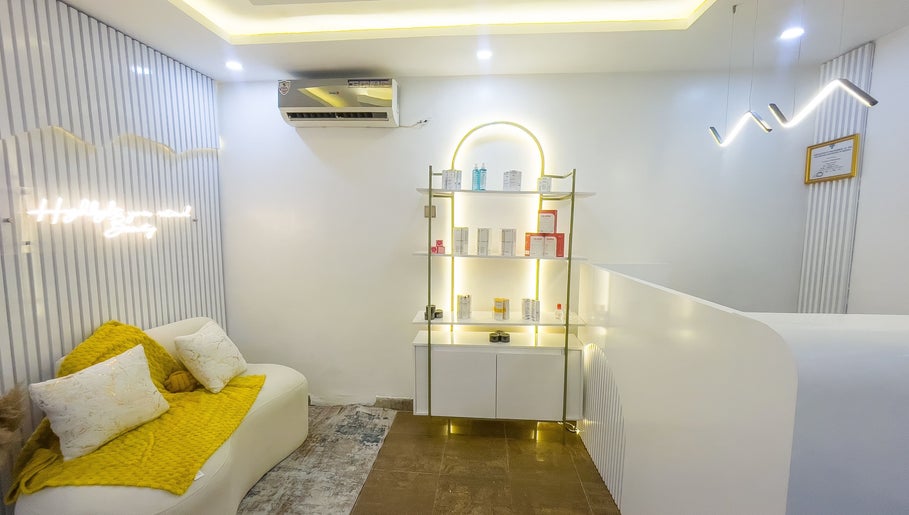 Elegant waiting area at Vitality Aesthetics & Spa, Lekki, Lagos, NG with modern decor and ambient lighting.