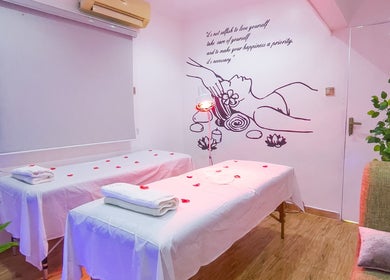 Calming treatment room at Vitality Aesthetics & Spa, Lekki, Lagos, NG with massage tables and soft lighting.