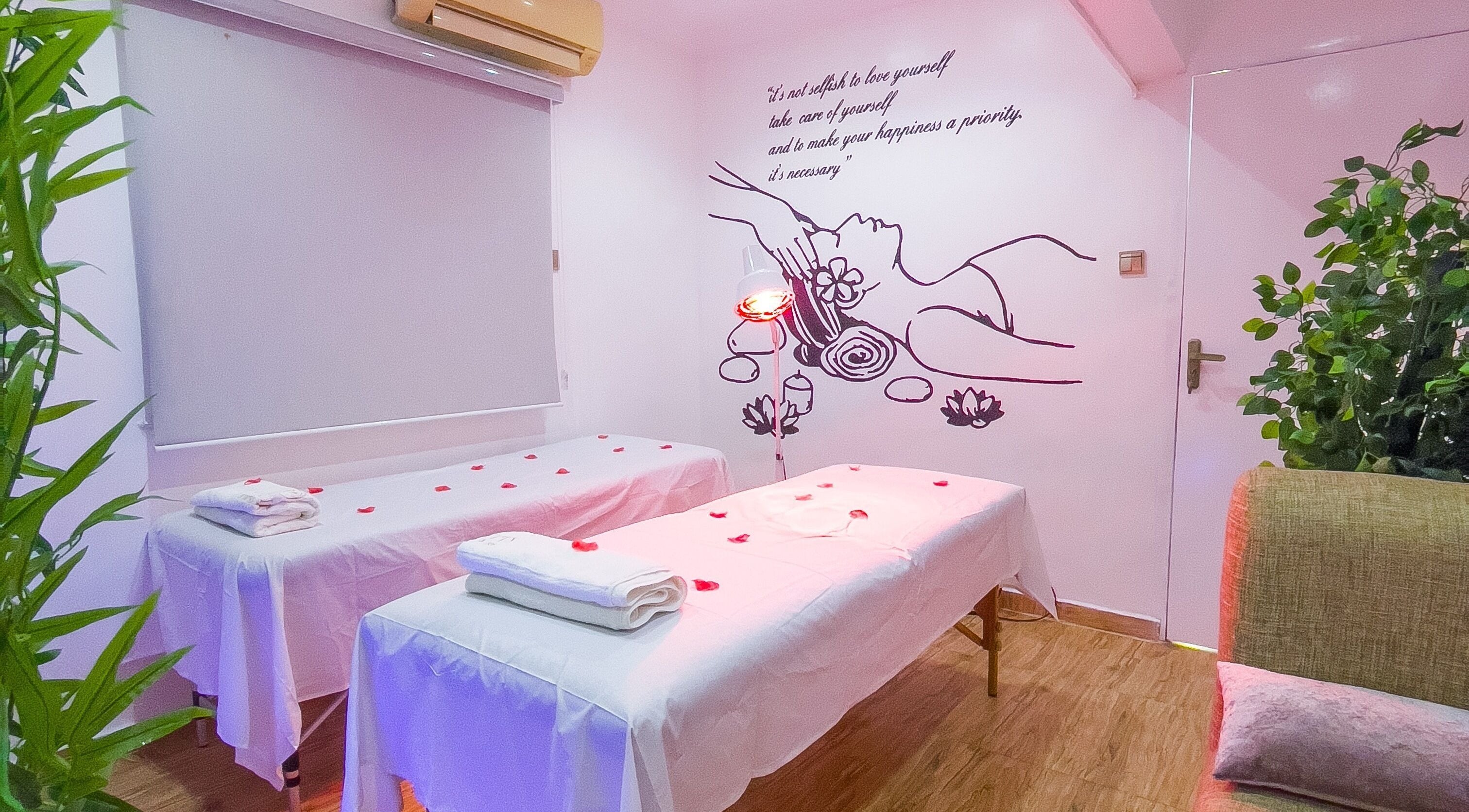 Calming treatment room at Vitality Aesthetics & Spa, Lekki, Lagos, NG with massage tables and soft lighting.