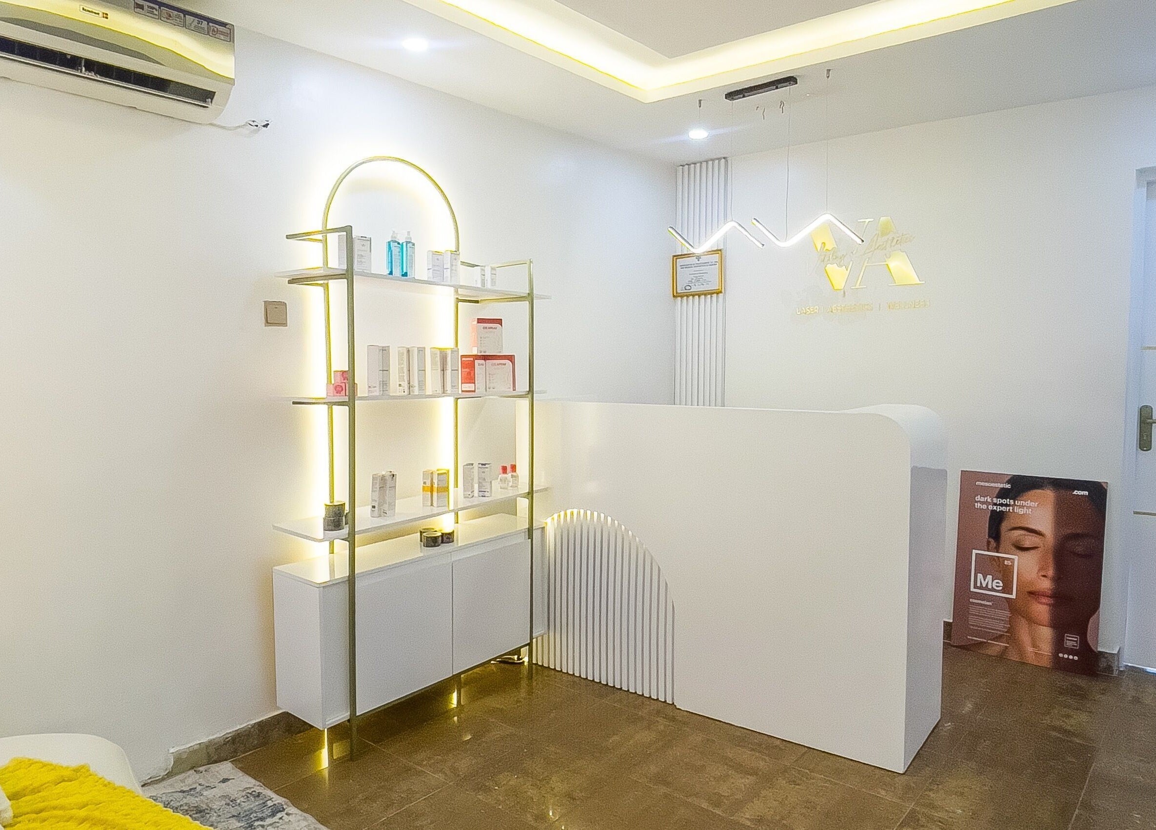 Reception area at Vitality Aesthetics & Spa, Lekki, Lagos showcasing elegant shelves and decor.
