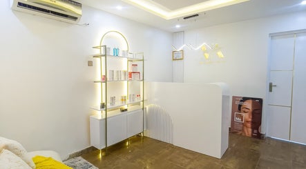Reception area at Vitality Aesthetics & Spa, Lekki, Lagos showcasing elegant shelves and decor.