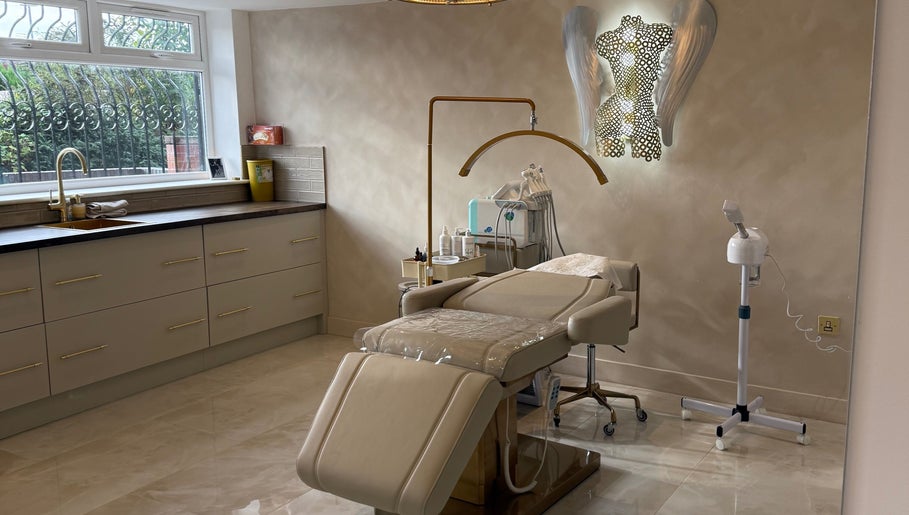 Luxurious treatment room at Skin Secrets By Amy Olivia, Hazel Grove, England, GB with modern decor.
