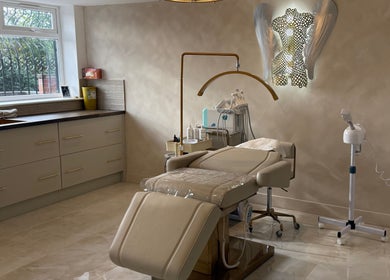 Luxurious treatment room at Skin Secrets By Amy Olivia, Hazel Grove, England, GB with modern decor.