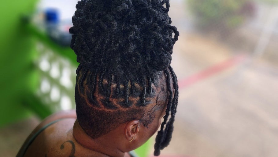 Intricate braided hairstyle at T'Hairapy Beauty Studio in Christ Church, Christ Church, BB.