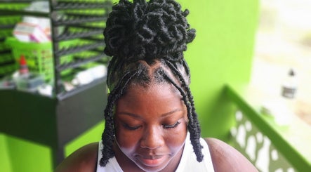 Stylish braided hairstyle at T'Hairapy Beauty Studio in Christ Church, Christ Church, BB.