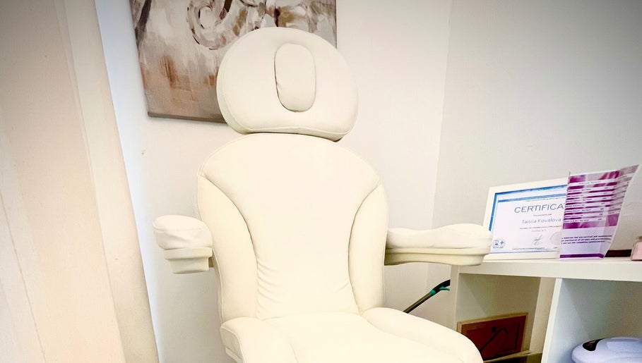 Elegant white chair in Taisiya Harding Nail Technician, Torquay, England, GB, showcasing comfort and style.