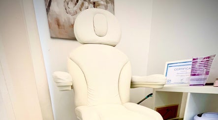 Elegant white chair in Taisiya Harding Nail Technician, Torquay, England, GB, showcasing comfort and style.