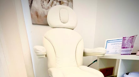 Comfortable spa chair at Taisiya Harding Nail Technician, Torquay, England, GB with certification on display.