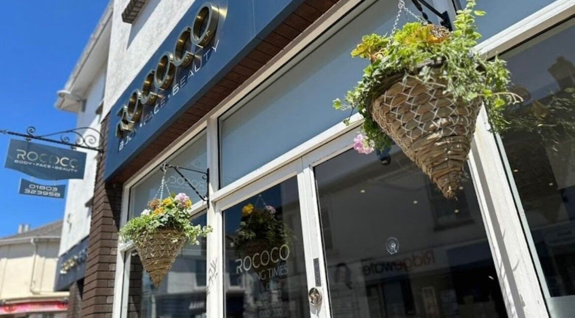 Exterior of beauty venue with hanging baskets, Taisiya Harding Nail Technician, Torquay, England, GB.