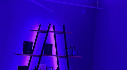 Chic shelving with vibrant lighting at Barbershop 24K Cutz, Stara Zagora, Stara Zagora, BG.