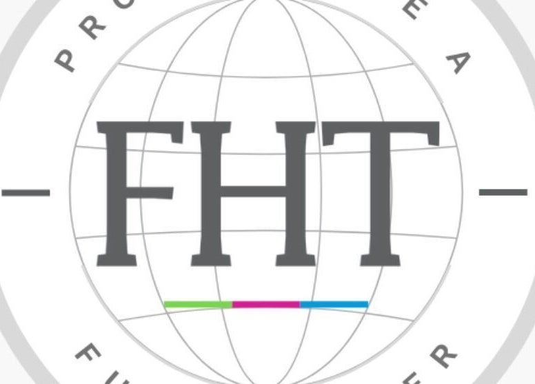 FHT logo displayed at Touched by Divinity, Heolgerrig, Wales, GB. Represents professional beauty and wellness services.