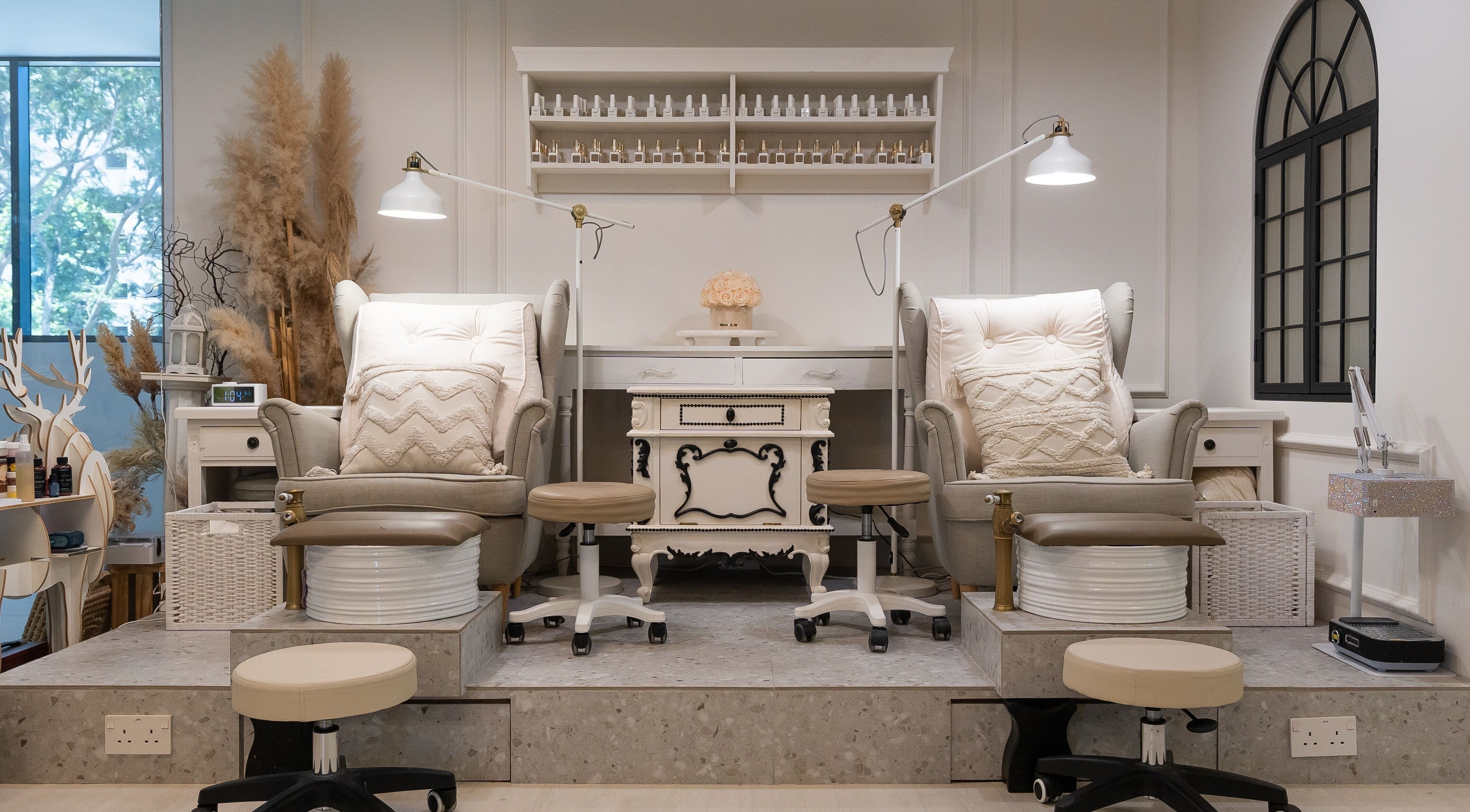 Luxurious pedicure chairs at Brownee Studio x TNC Gallery, Singapore, Singapore, SG with elegant decor.
