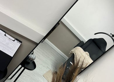 Elegant salon interior with modern mirror at Urban Beauty by Leigha, Southampton, England, GB.