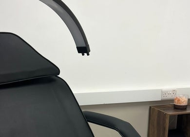 Treatment chair and lamp at Urban Beauty by Leigha, Southampton, England, GB offering relaxation.