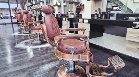 Elegant salon chairs at KUPA CARELINE SALON, Arad, Muḥāfaẓat Al-muḥarraq, BH, showcasing luxury styling.