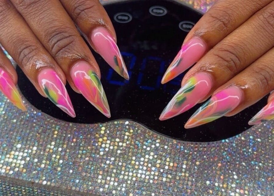 Stunning colorful nail art at Emb Luxe Nails, Eastlynne, Saint George, BB, showcasing elegance and creativity.