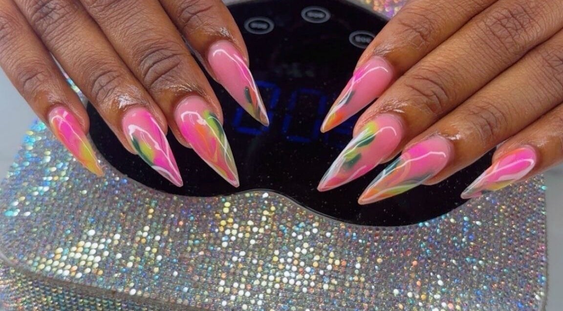 Stunning colorful nail art at Emb Luxe Nails, Eastlynne, Saint George, BB, showcasing elegance and creativity.