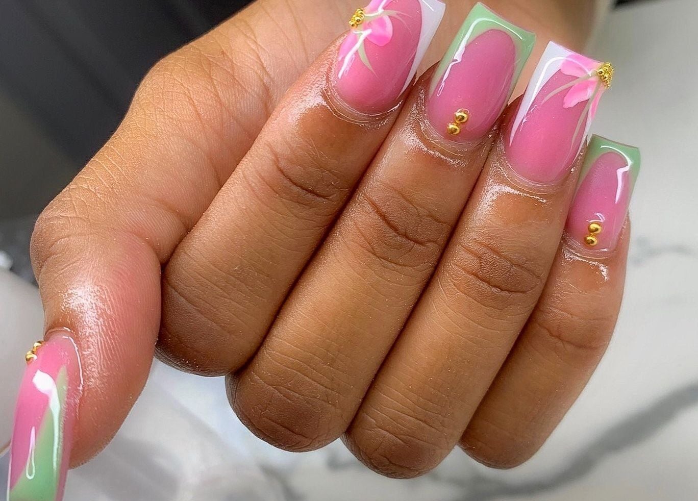 Elegant pink floral nail art at Emb Luxe Nails, Eastlynne, Saint George, BB.