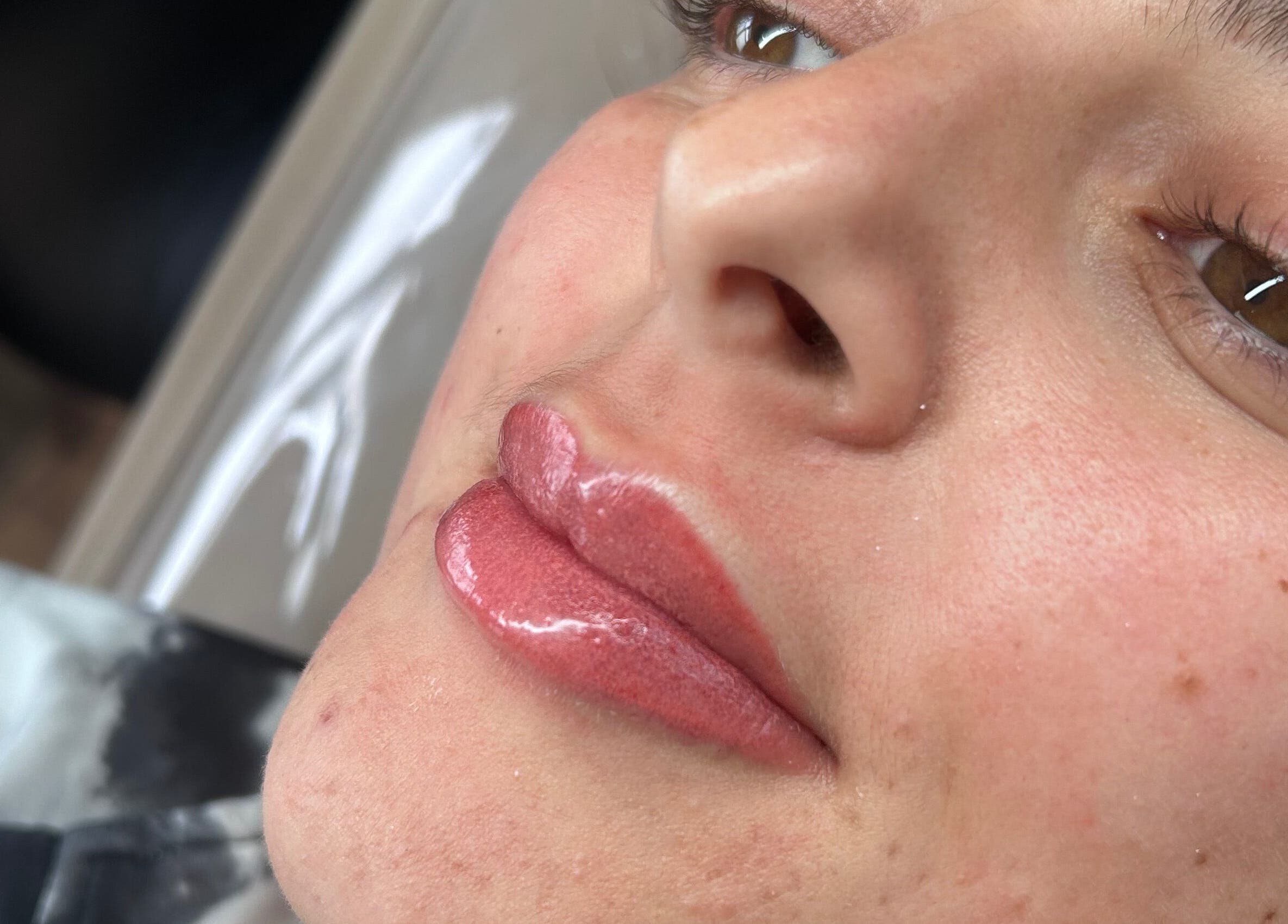 Close-up of glossy lips at Studio by Mimi, Bedford, England, GB showcasing expert beauty care.