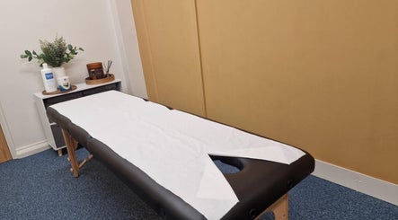 Treatment room at Revive Sports Therapy And Massage in York, England, GB, featuring a massage table.
