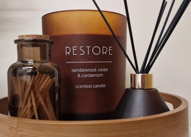 Aromatic restoration setup at Revive Sports Therapy And Massage, York, England, GB with candle and diffusers.