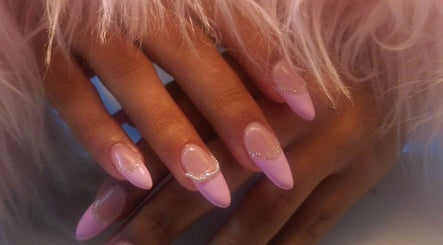 Elegant pink manicured nails with beads at Isabella's Nails and Beauty, Cape Town, Western Cape, ZA.