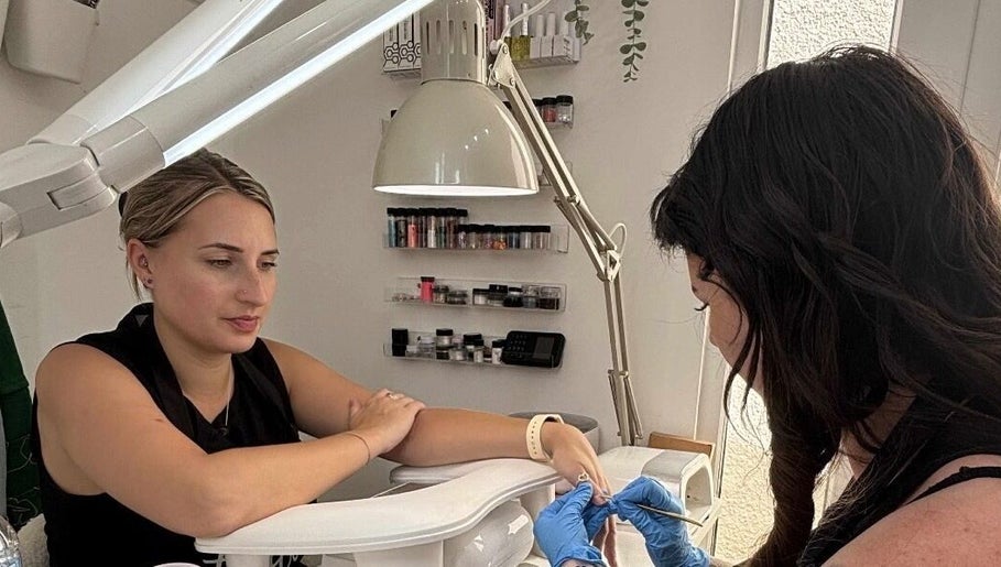 Nail technician at Be.You.Tiful beauty by Liss, Honiton, England, GB, performing detailed nail art