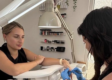 Nail technician at Be.You.Tiful beauty by Liss, Honiton, England, GB, performing detailed nail art