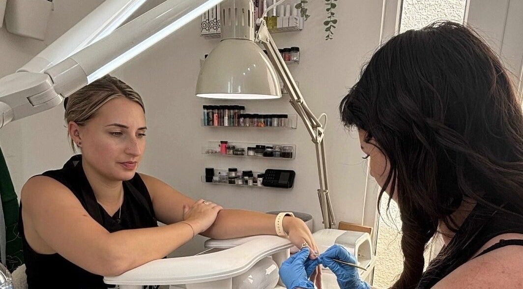 Nail technician at Be.You.Tiful beauty by Liss, Honiton, England, GB, performing detailed nail art