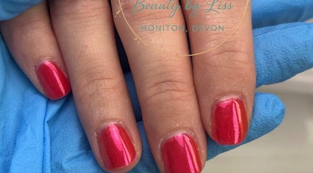 Bright red manicure at Be.You.Tiful beauty by Liss, Honiton, England, GB, showcasing expert nail care.