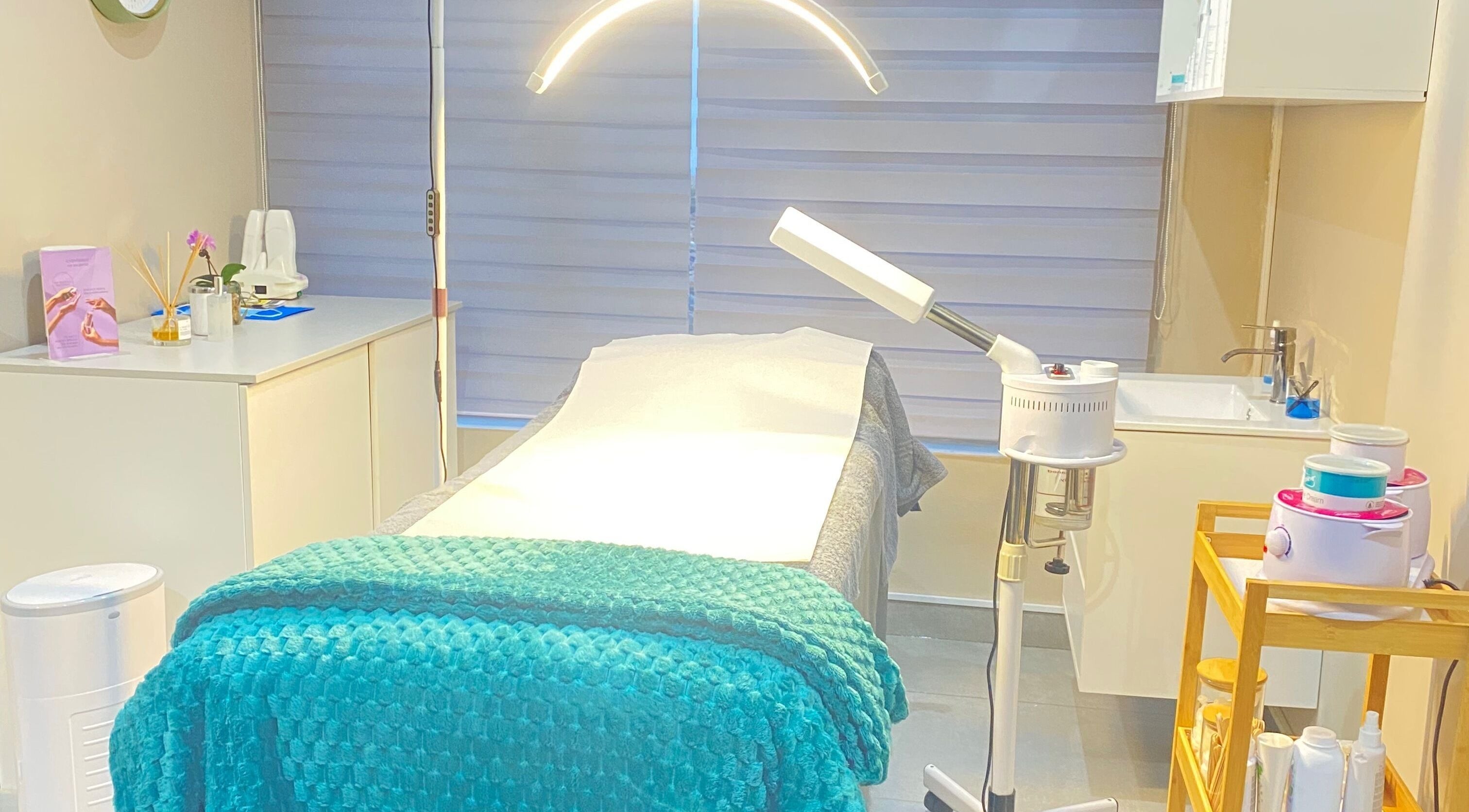 Lemaître Aesthetics treatment room in Sandton, Gauteng, ZA with cozy setup and modern equipment.