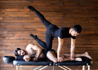 Expert massage at MR WELLNESS In Motion, San Francisco, California, US, showcasing therapeutic balance.