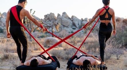 Outdoor wellness session with resistance bands at MR WELLNESS In Motion, San Francisco, California, US.