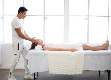 Calming massage session at MR WELLNESS In Motion, San Francisco, California, US. Tranquil and serene atmosphere.