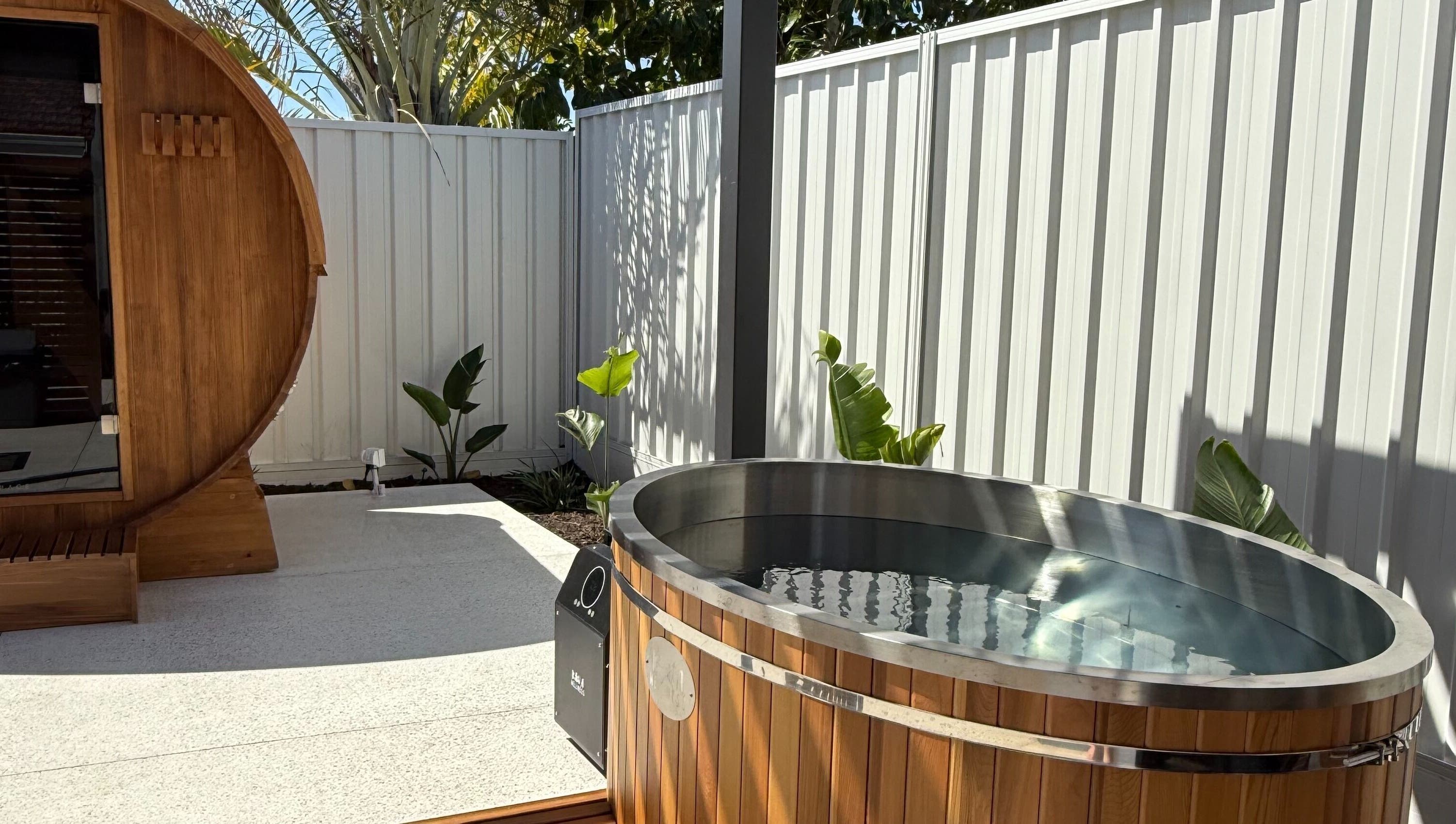 Luxury outdoor sauna and tub at Rise and Fall Wellness, Kallaroo, Western Australia, AU.
