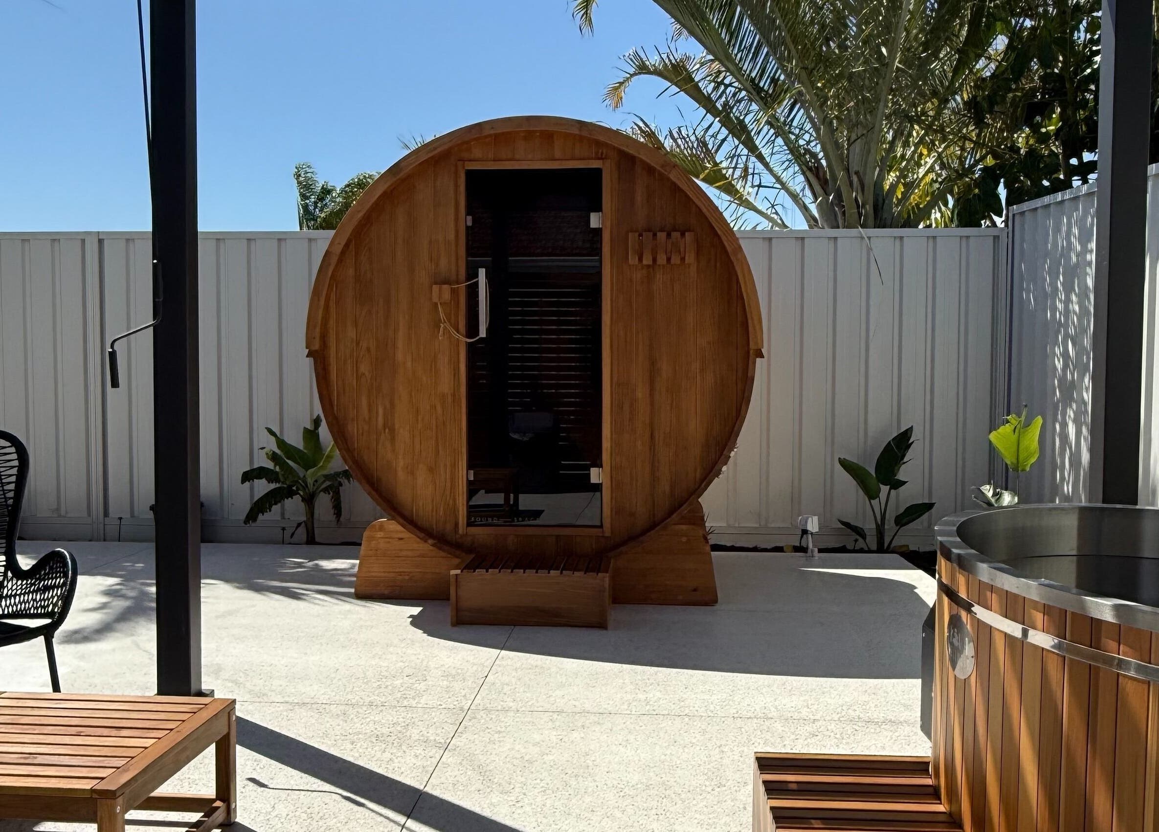 Relaxing barrel sauna at Rise and Fall Wellness, Kallaroo, Western Australia, AU, offering wellness retreats.