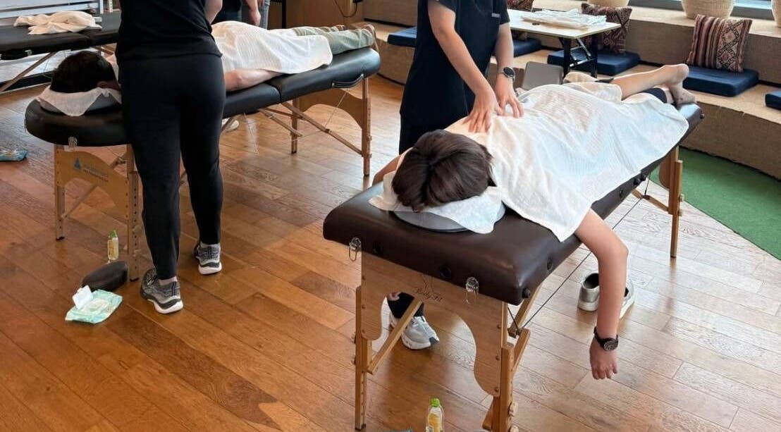 Professional massage therapy in progress at Working Space, SG, offering a tranquil wellness experience.