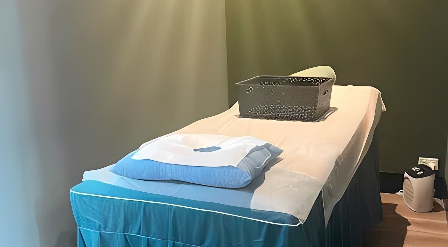 Massage table at House Of Jing, Rockingham, Western Australia, AU, showcasing a relaxing treatment space.
