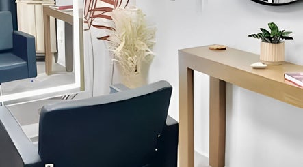 Chic seating area at Marmac Studio, Chula Vista, California, US with plants and modern decor.
