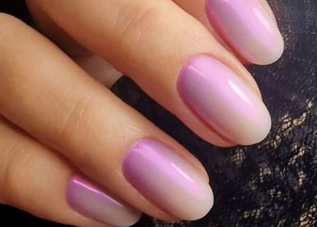 Elegant pastel purple nails at MODE, Thetford, England, GB, showcasing expert nail artistry.