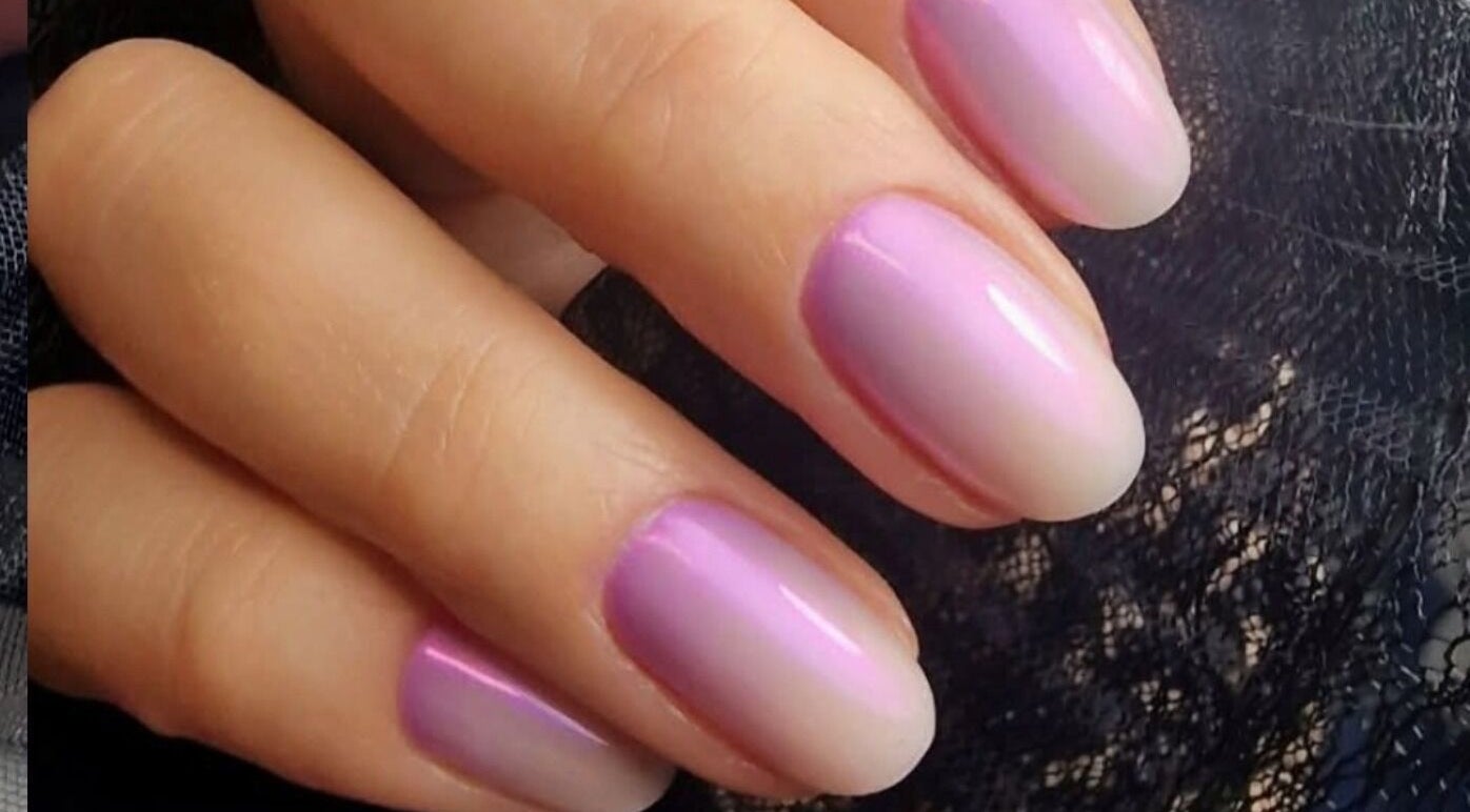 Elegant pastel purple nails at MODE, Thetford, England, GB, showcasing expert nail artistry.