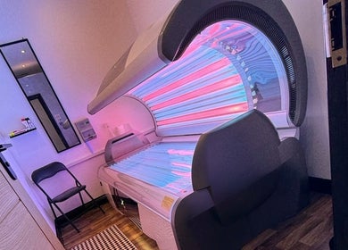Tanning bed at Divine Aesthetics & Beauty in Crewe, England, GB, offering a serene, high-tech experience.