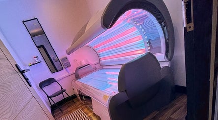 Tanning bed at Divine Aesthetics & Beauty in Crewe, England, GB, offering a serene, high-tech experience.