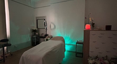 Tranquil treatment room at Face it with glow, Southampton, England, GB, featuring a massage table and ambient lighting.