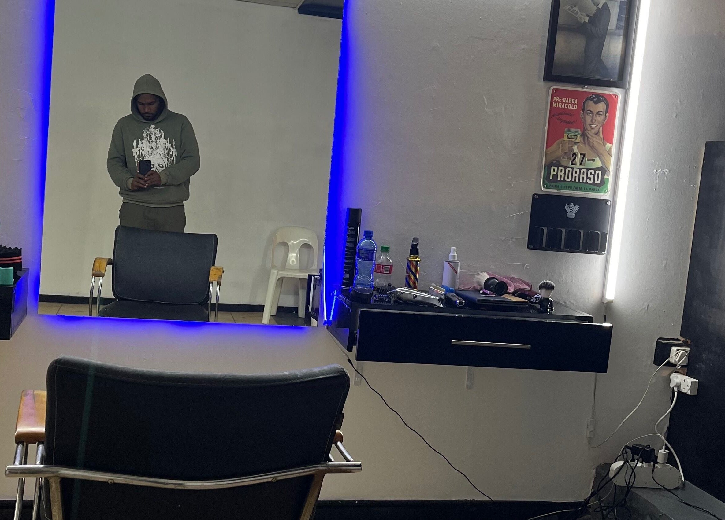 Stylish salon interior at Darthfader031, Roodepoort, Gauteng, ZA featuring modern chairs and mirror.