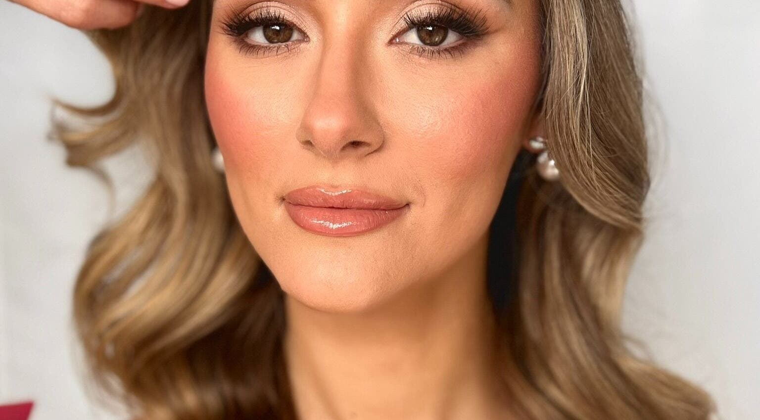 Elegant makeup by Shanie Wright Makeup in Hertford, England. Natural tones enhance beauty and sophistication.