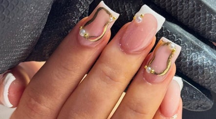 Elegant nail art with gold accents at Nella beauty, Oldbury, England, GB.